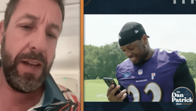split screen screenshot, Adam Sandler on left, Derrick Henry in Ravens jersey on right looking at phone